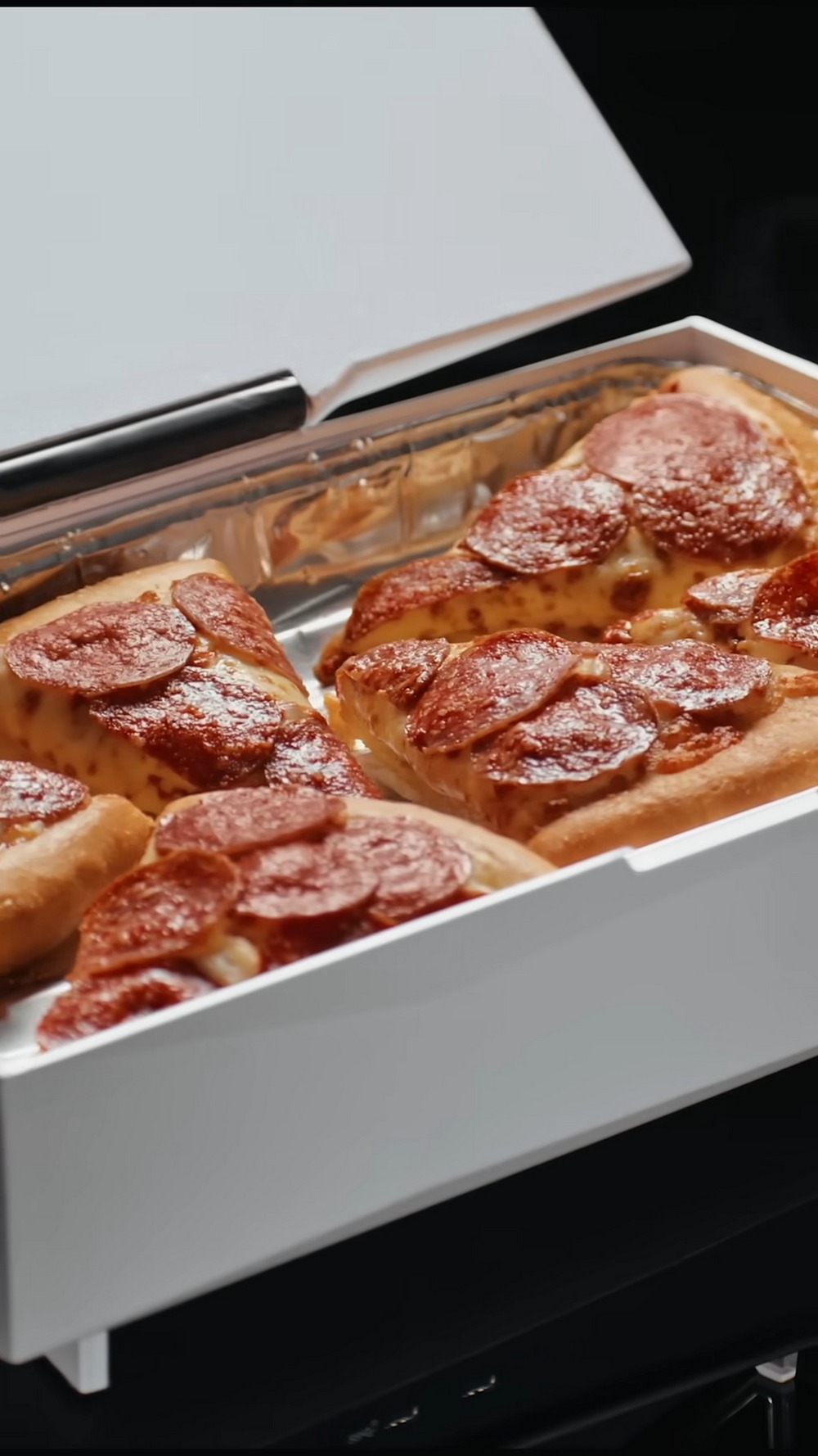邊玩電動邊加熱披薩!加拿大必勝客推出 PS5 加熱器 PIZZAWRMR - 電腦王阿達 邊玩電動邊加熱披薩!加拿大必勝客推出 PS5 加熱器 PIZZAWRMR - 電腦王阿達